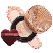 Charlotte Tilbury 
Airbrush Flawless Blur Loose Setting PowderColor: Brightening Peach - ultra brightening for medium skin tones, soft brightening for tan-deep skin tones