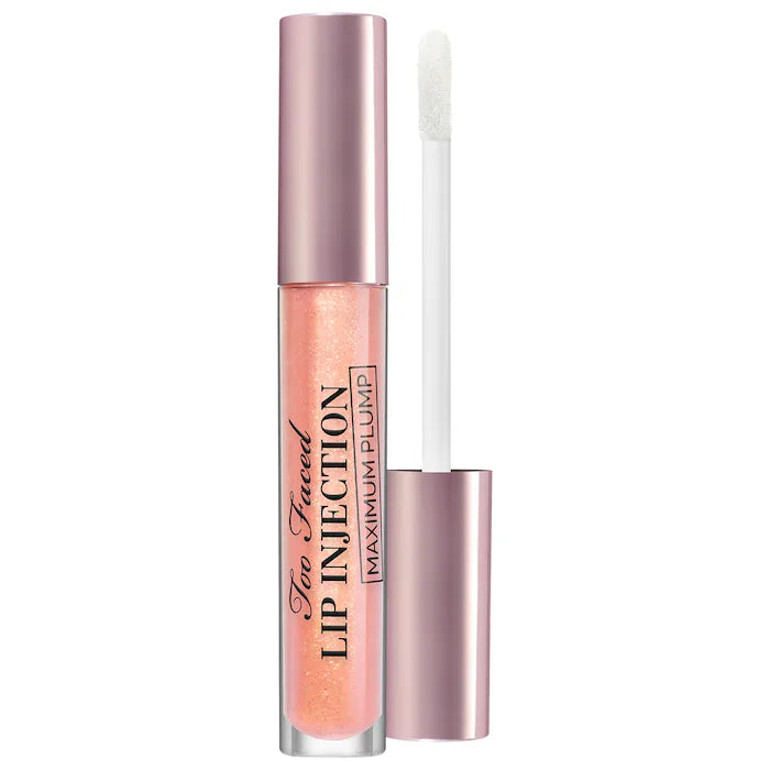 Too Faced 
Lip Injection Maximum Plump Extra Strength Hydrating Lip PlumperColor: Cotton Candy Kisses - light pink with gold pearl