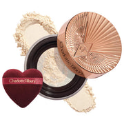 Charlotte Tilbury 
Airbrush Flawless Blur Loose Setting Powder Color: Translucent Fair/Medium - fair-medium skin tones with a neutral undertoneNew