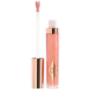 Charlotte Tilbury 
Collagen Lip Bath Gloss Color: Pillow Talk Fair - cool nude pink