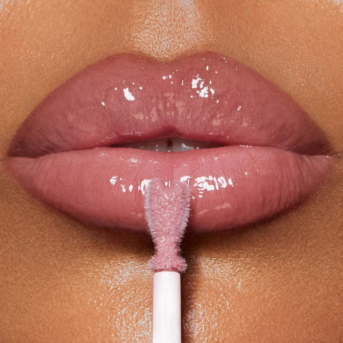 Charlotte Tilbury 
Collagen Lip Bath Gloss Color: Pillow Talk Fair - cool nude pink