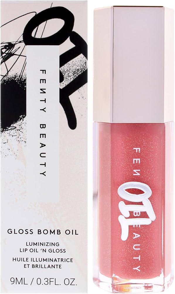 Fenty Beauty by Rihanna 
Gloss Bomb Oil Luminizing Lip Oil 'N Gloss Color: Fu$$Y - sparkling dusty pink