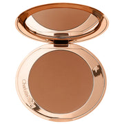 Charlotte Tilbury 
Refillable Airbrush Matte Bronzer Color: Tan - medium deep bronze