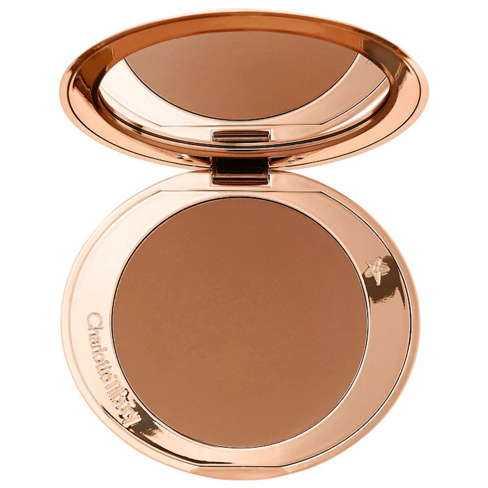Charlotte Tilbury 
Refillable Airbrush Matte Bronzer Color: Tan - medium deep bronze