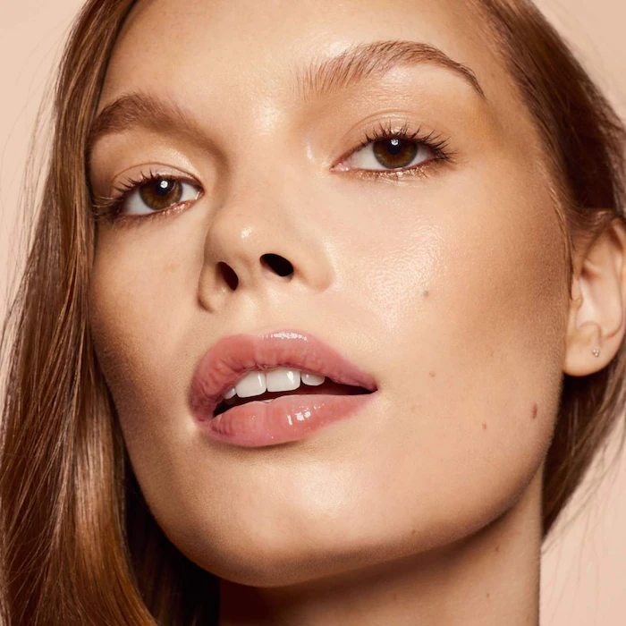 Fenty Beauty by Rihanna  Gloss Bomb Heat Universal Lip Luminizer + PlumperColor: Fenty Glow - sheer rose nude - Image 3